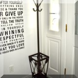 F90. Coat and umbrella stand with arrow decorations. 